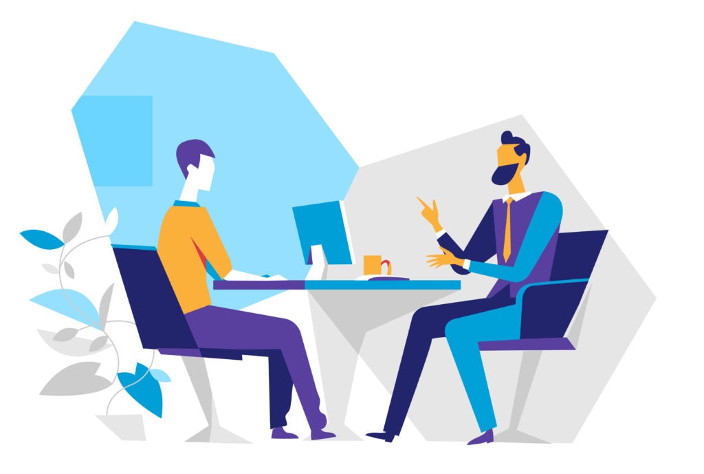 Arbeitsplatz mit Maske und Laptop