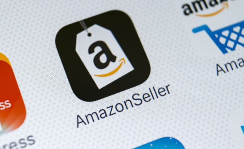 Nahaufnahme des Amazon Seller App-Logos auf einem Smartphone-Display
